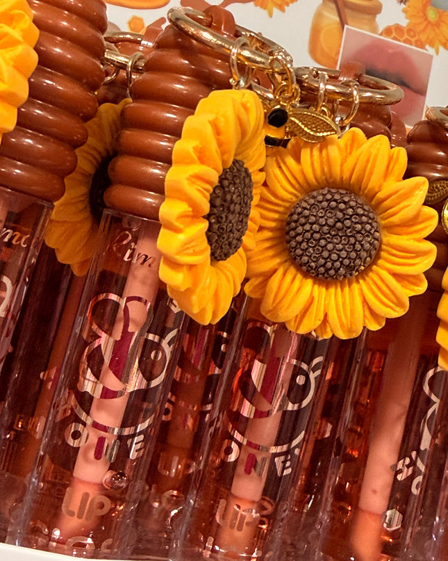GIRLY’s - GLOSS CON LLAVERO DE GIRASOL CON ABEJA (GRANDE) 🌻🐝