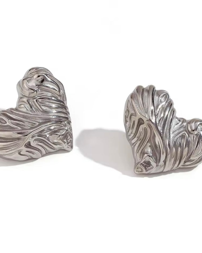 JOYERIA - Aretes de Corazón Rasgado